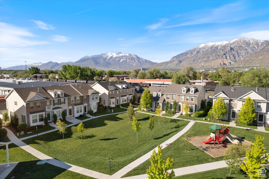 Aerial view of residential area featuring mountains