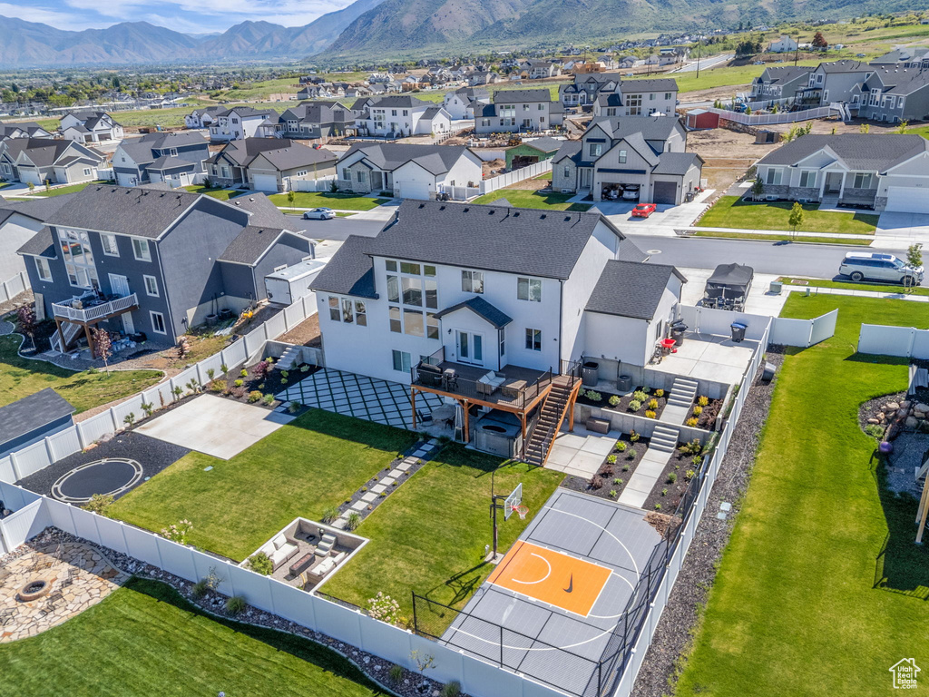 Aerial perspective of suburban area with mountains