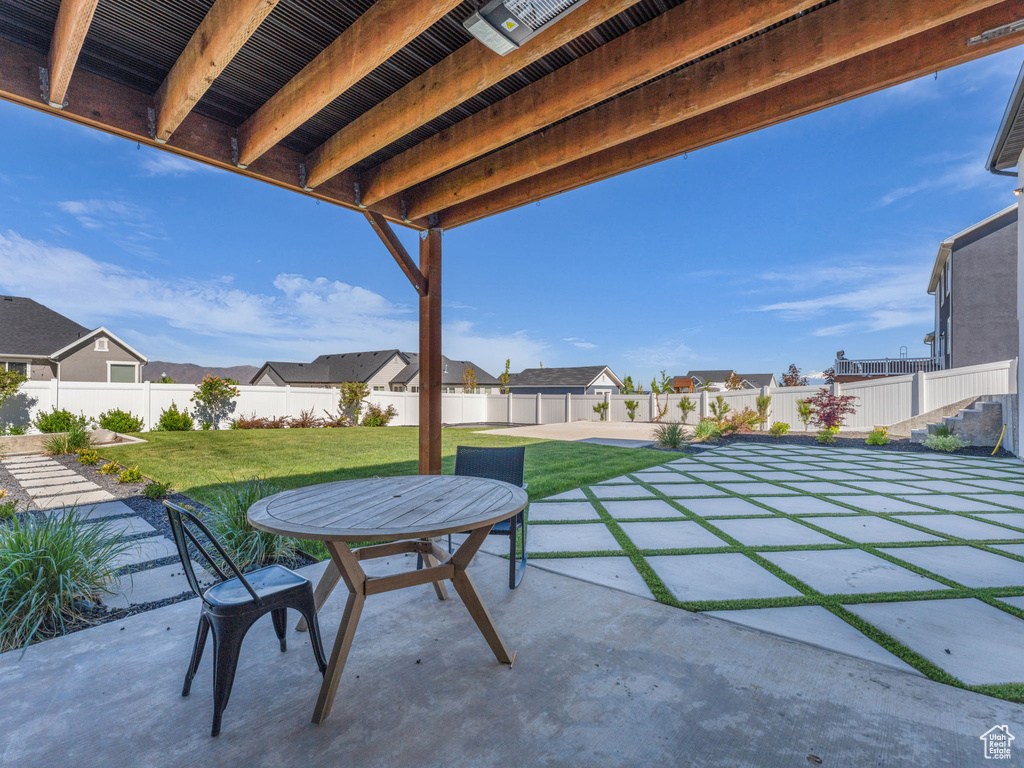 View of patio featuring a residential view and outdoor dining space