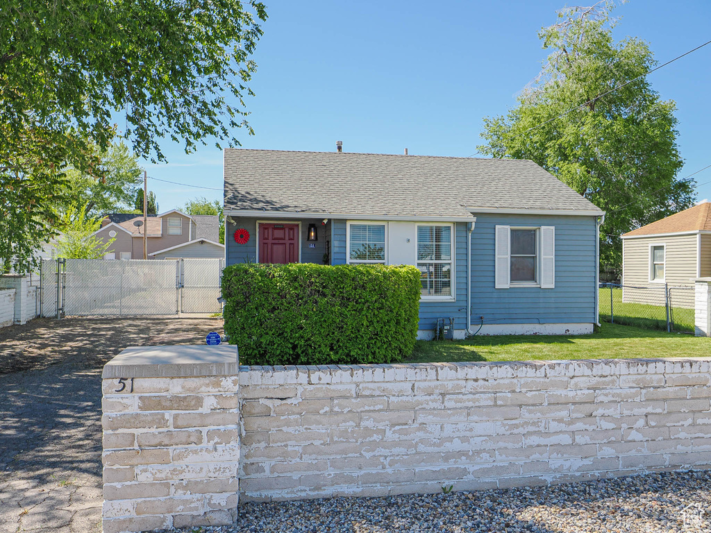 Bungalow-style home with driveway