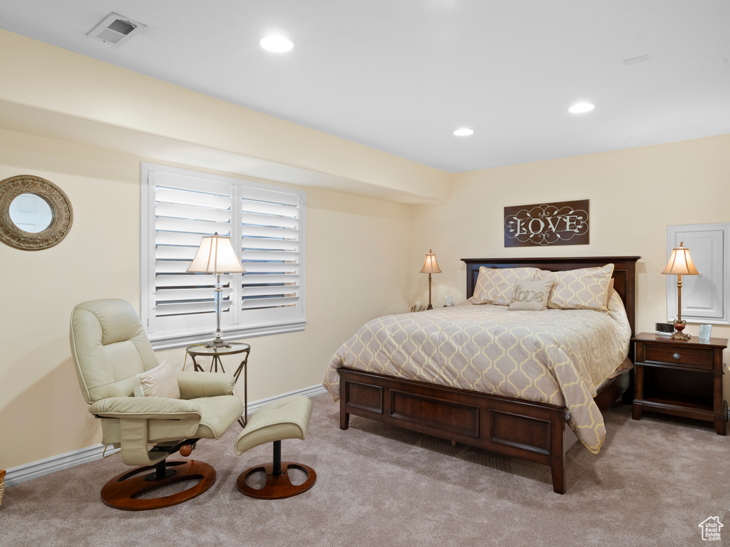 Bedroom featuring carpet flooring, baseboards, and recessed lighting