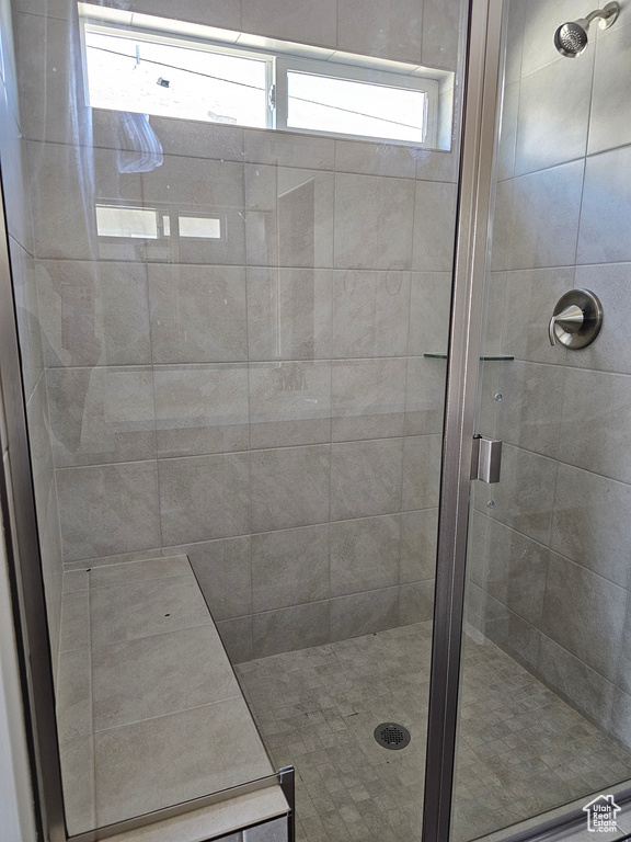 Bathroom featuring a stall shower