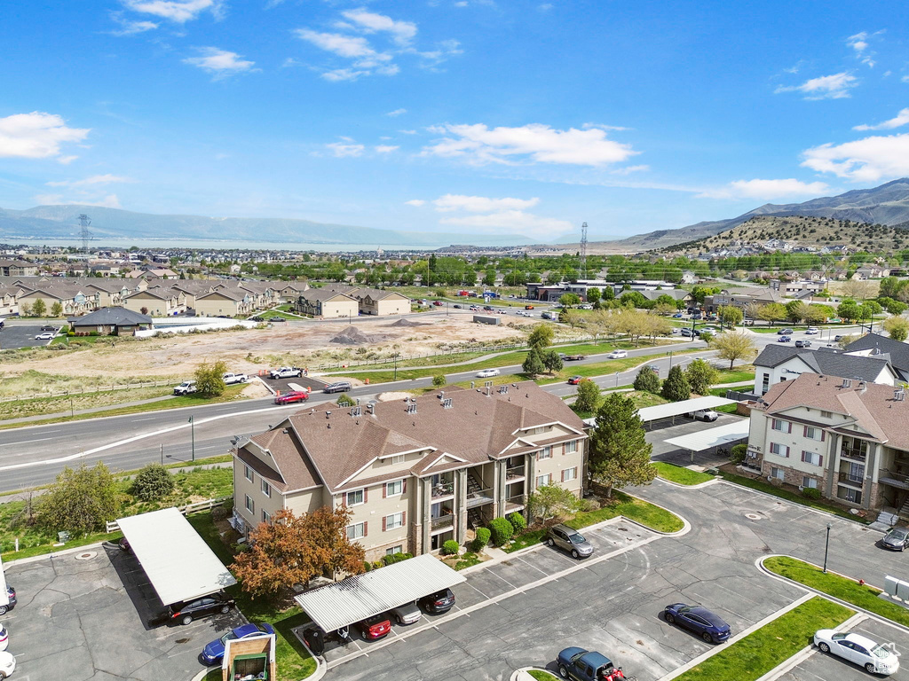 Aerial perspective of suburban area featuring a mountain backdrop