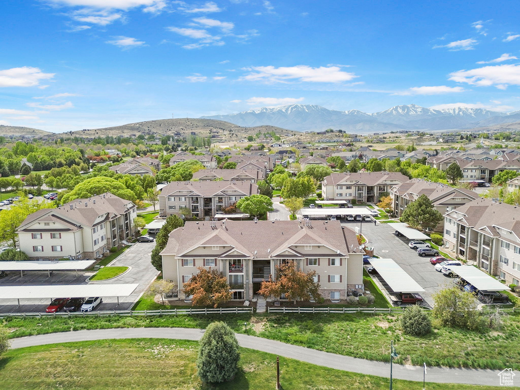 Aerial view of residential area with a mountainous background