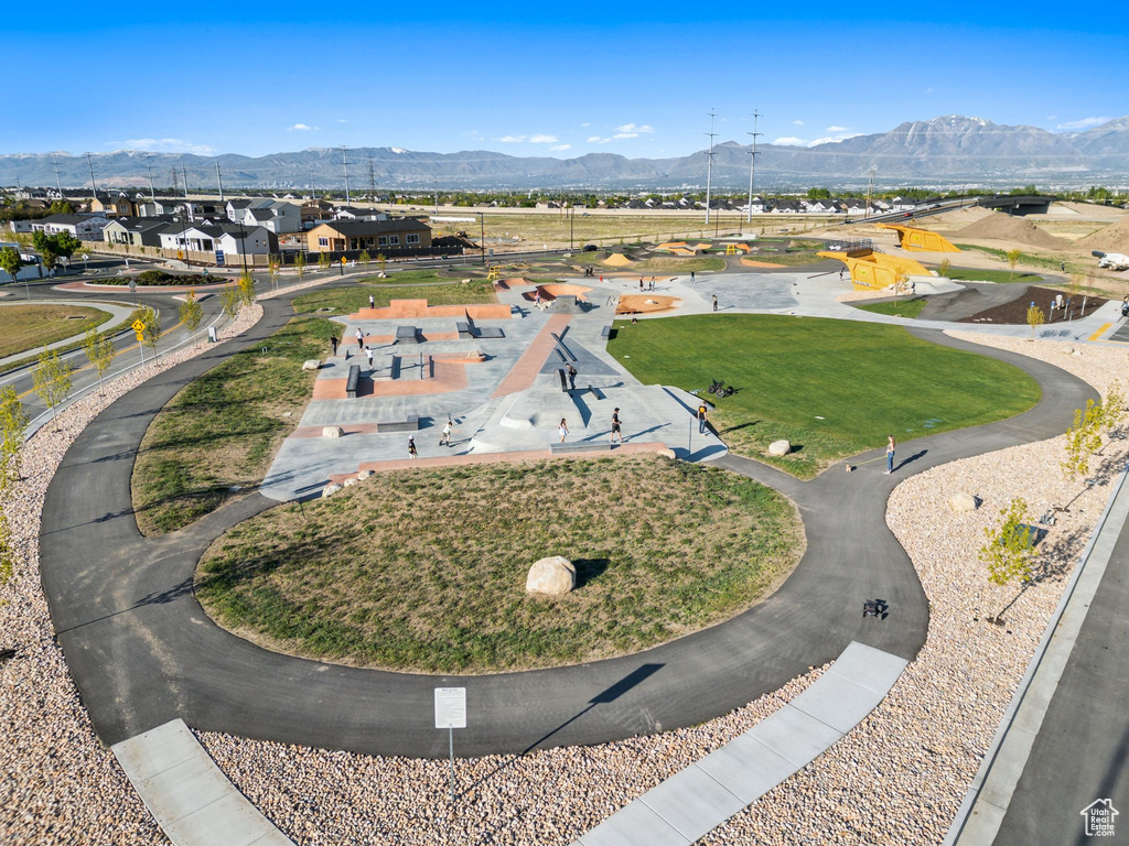 Aerial perspective of suburban area with a mountainous background