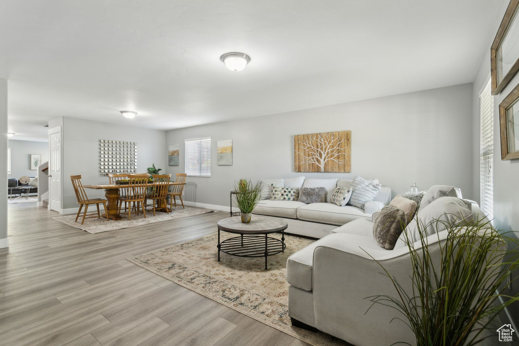 Living room with wood finished floors and baseboards
