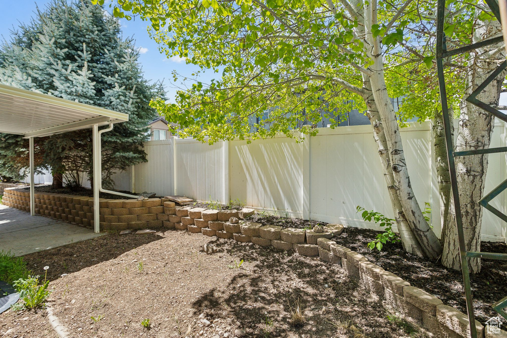 View of yard with fence
