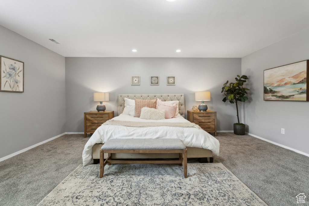 Bedroom featuring carpet, baseboards, and recessed lighting