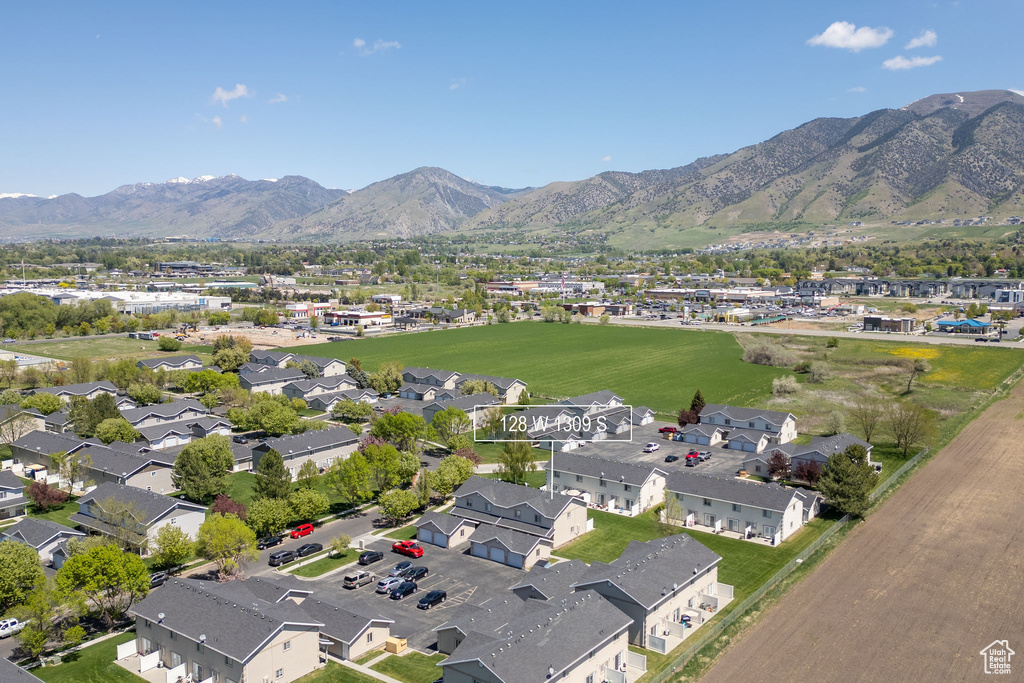 Aerial view of residential area with a mountainous background