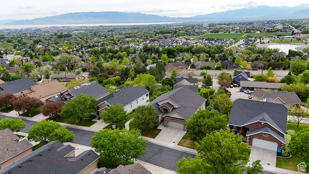 Aerial view of residential area with a mountainous background