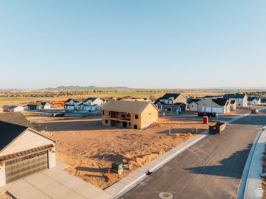 Aerial perspective of suburban area featuring mountains