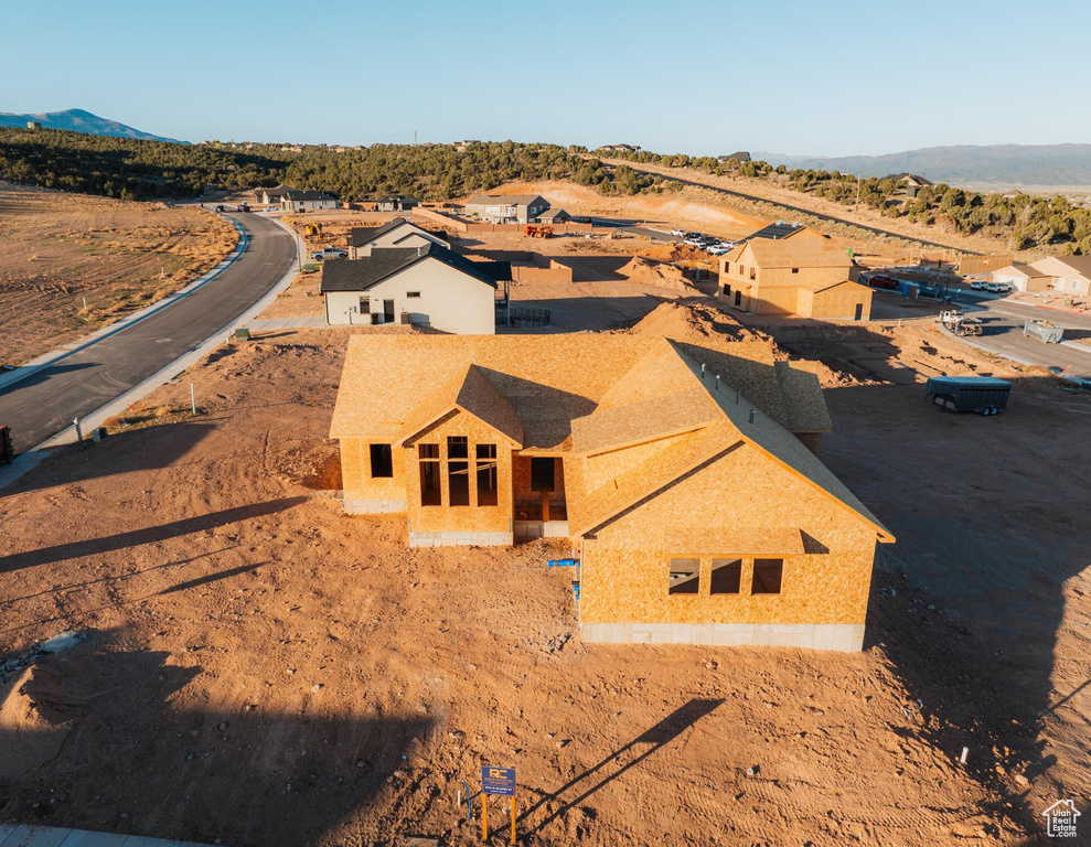 View of subject property featuring mountains