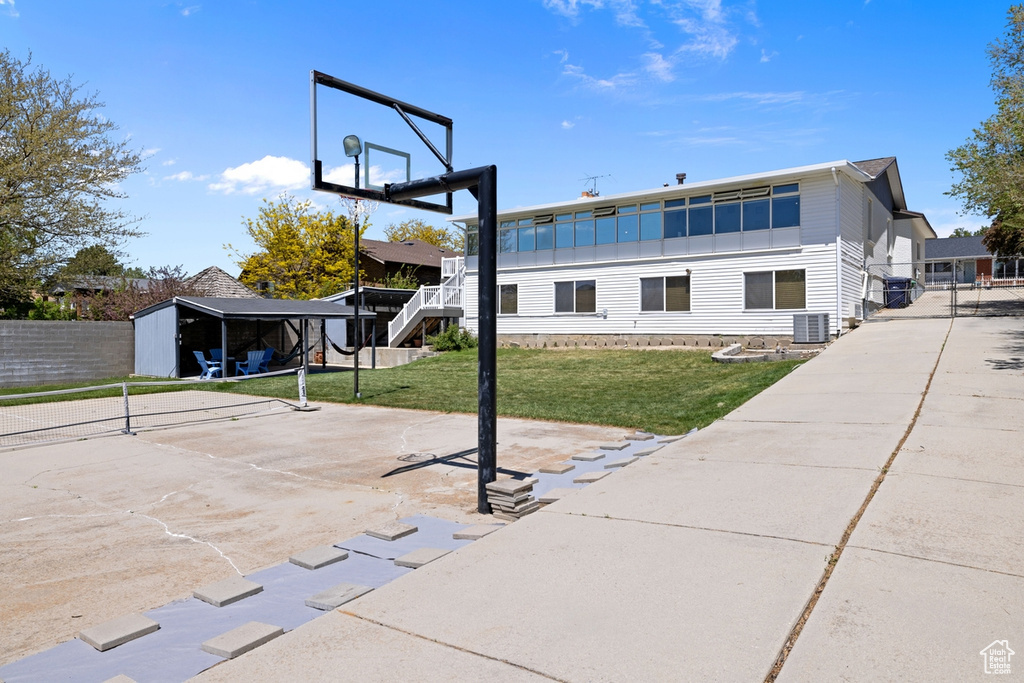 View of sport court with basketball hoop