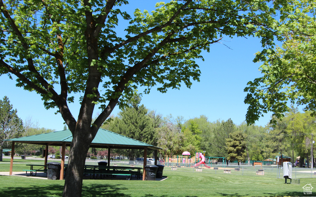 Surrounding community with a gazebo and a yard