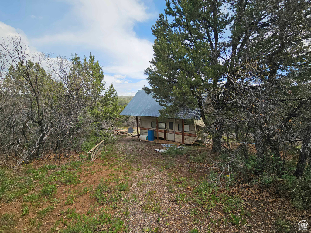 View of yard with a porch