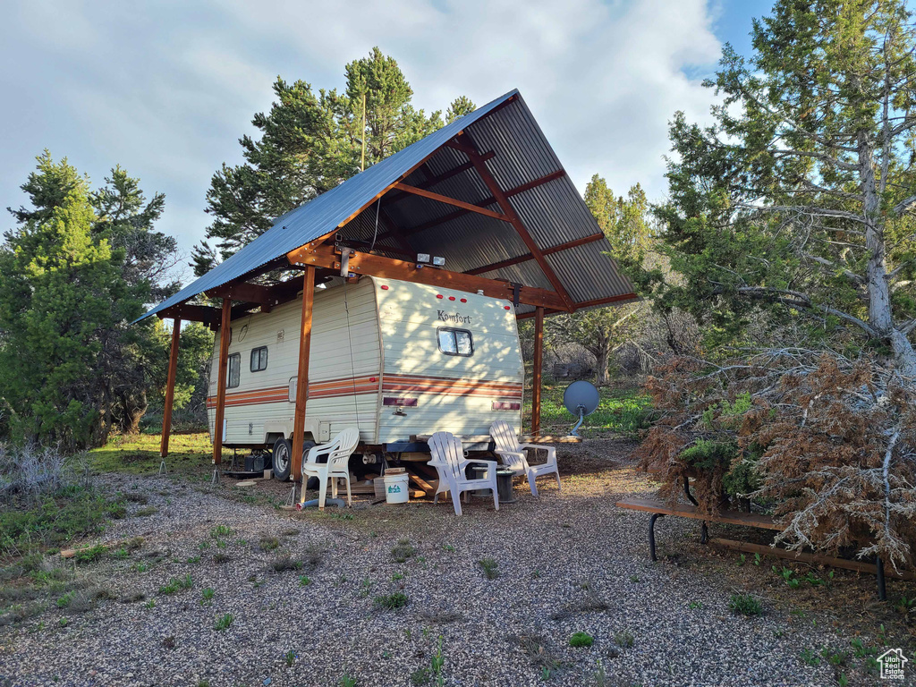View of home's exterior featuring metal roof