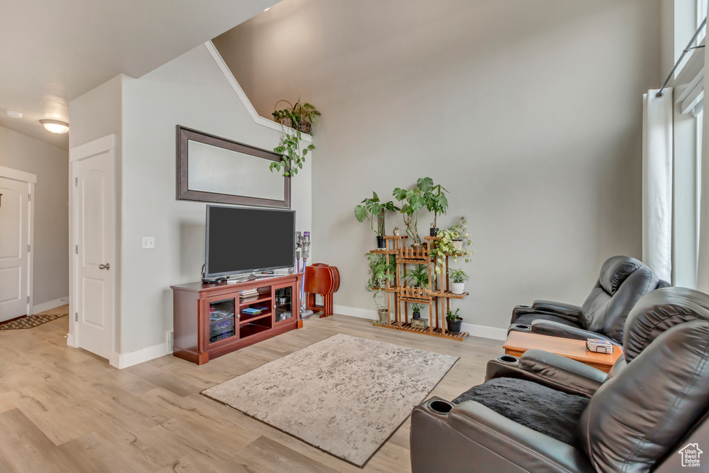 Living room with wood finished floors and baseboards