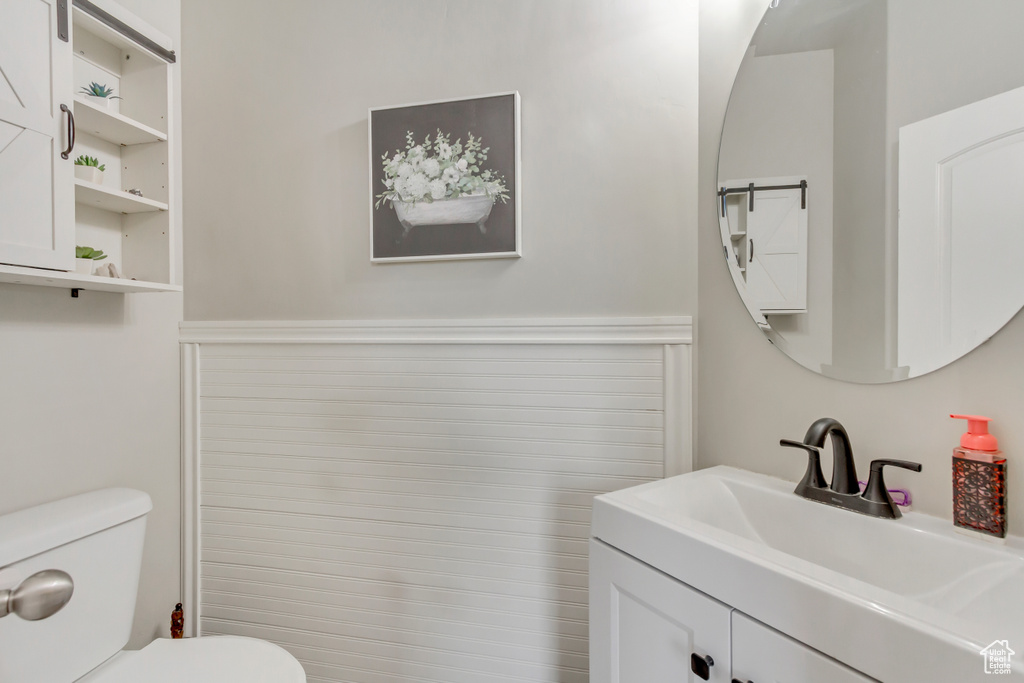 Bathroom with toilet and vanity
