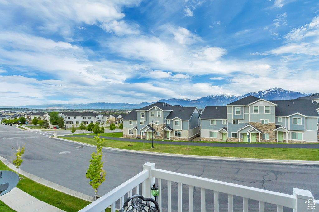 Balcony with a mountain view and a residential view