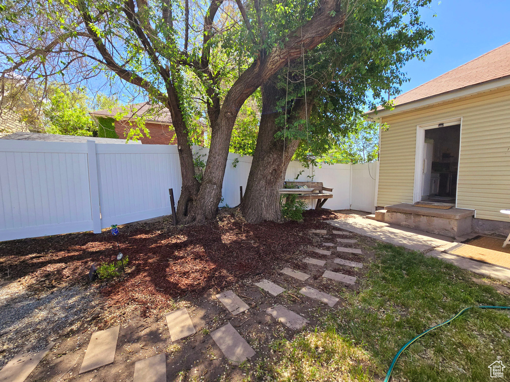 View of fenced backyard
