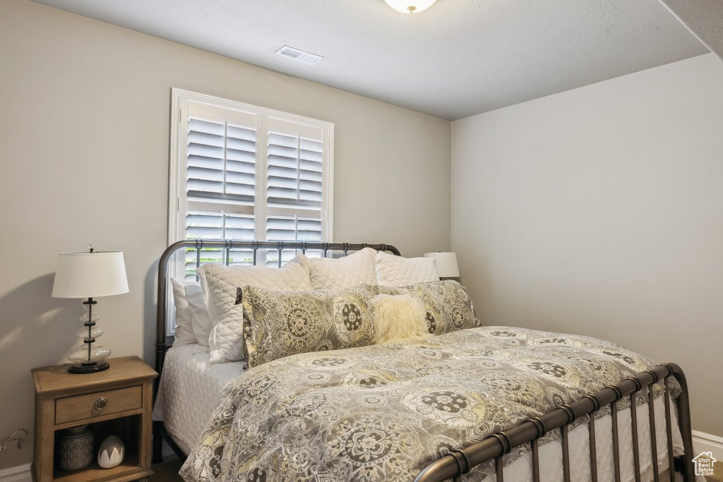 Bedroom with baseboards