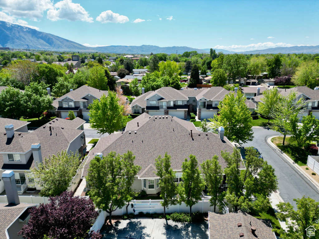 Aerial view of residential area with a mountainous background