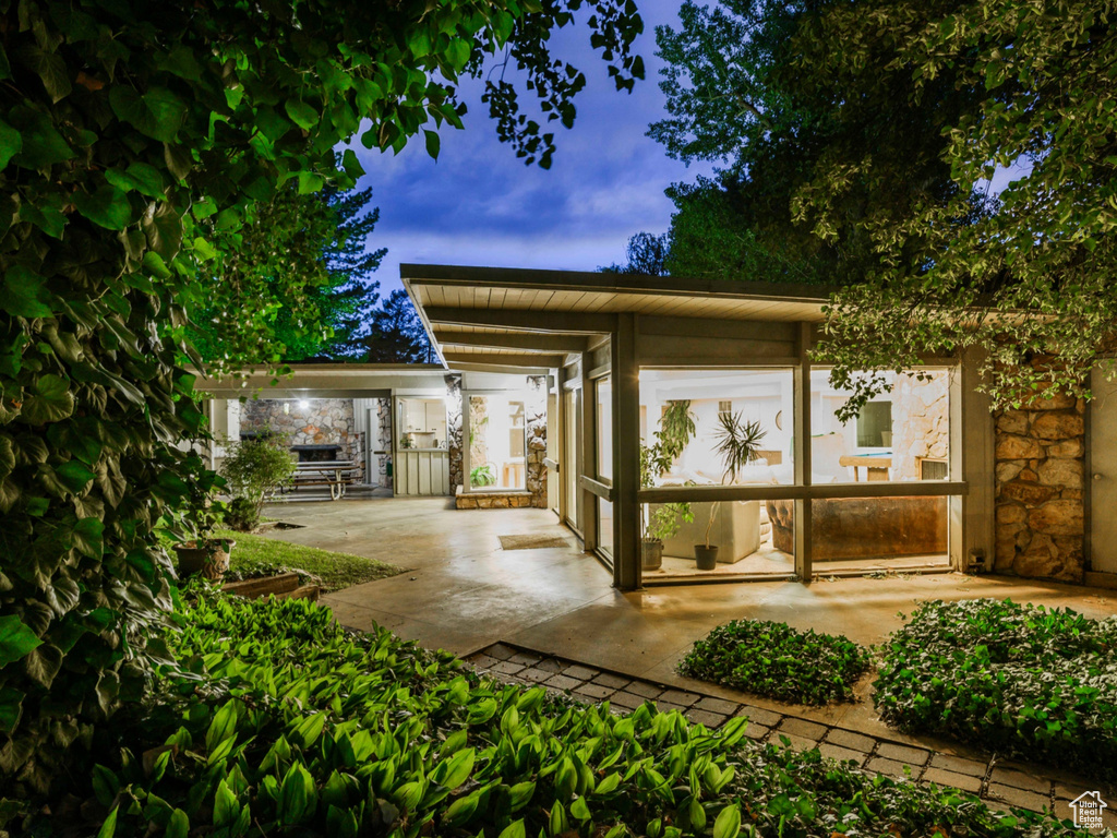 Back of property with a patio area