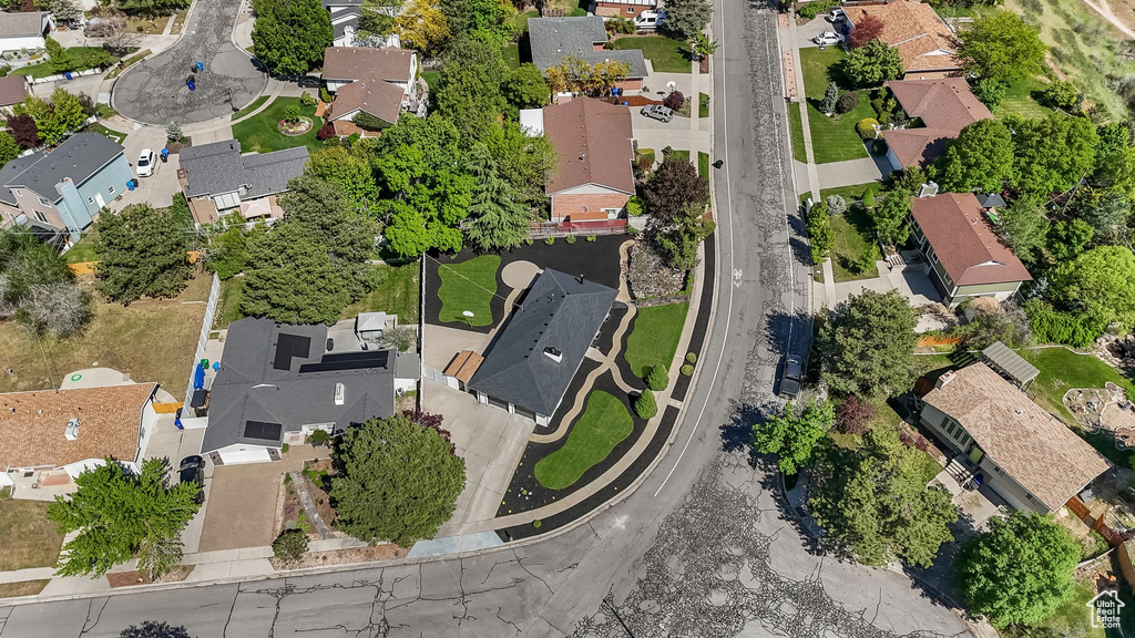 Aerial overview of property's location featuring nearby suburban area
