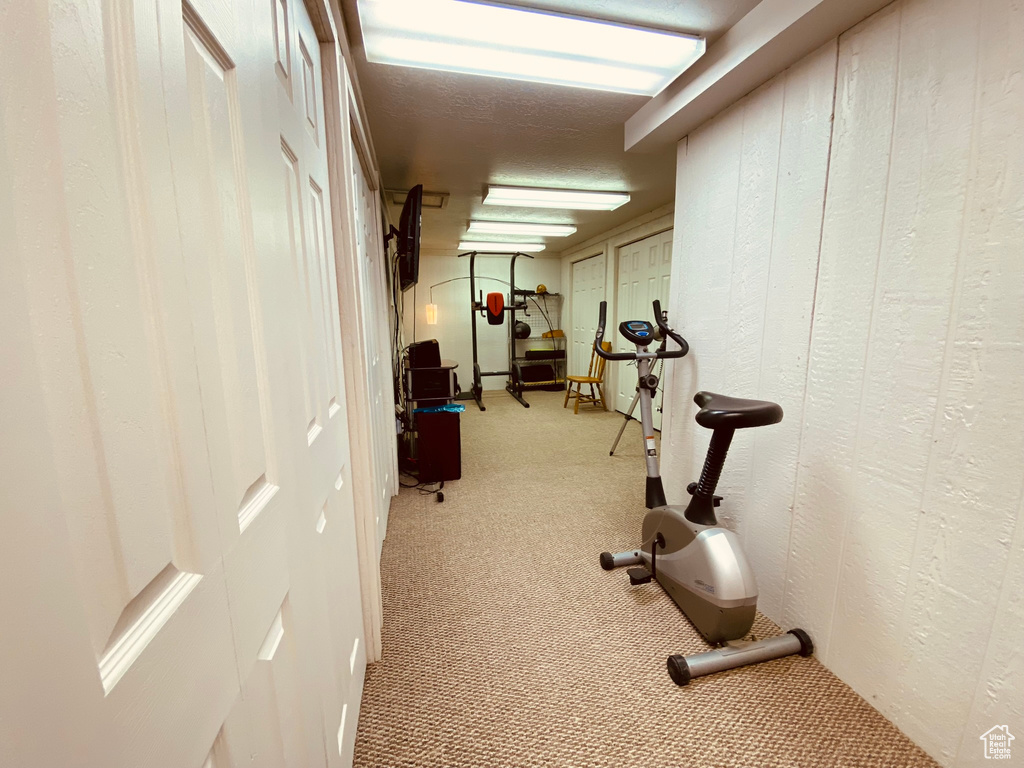 Exercise room with carpet floors