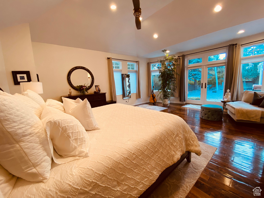 Bedroom with access to exterior, wood-type flooring, recessed lighting, vaulted ceiling, and french doors