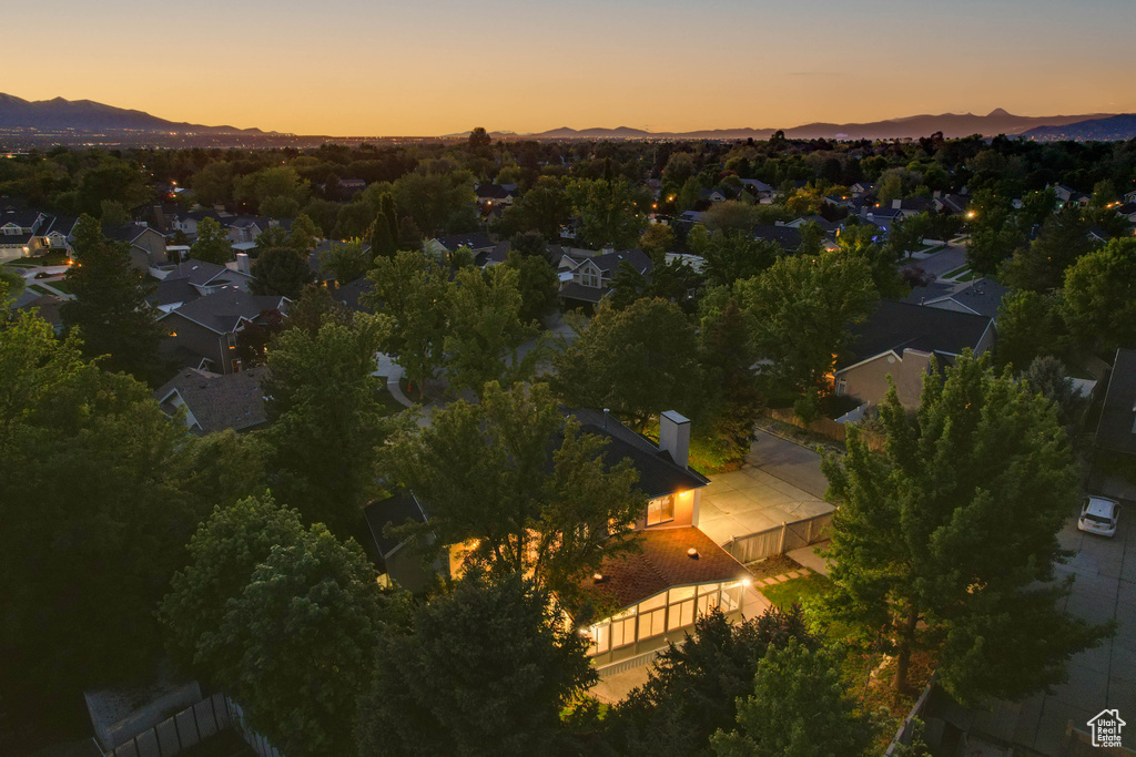 Aerial view at dusk of a mountain view and a residential view
