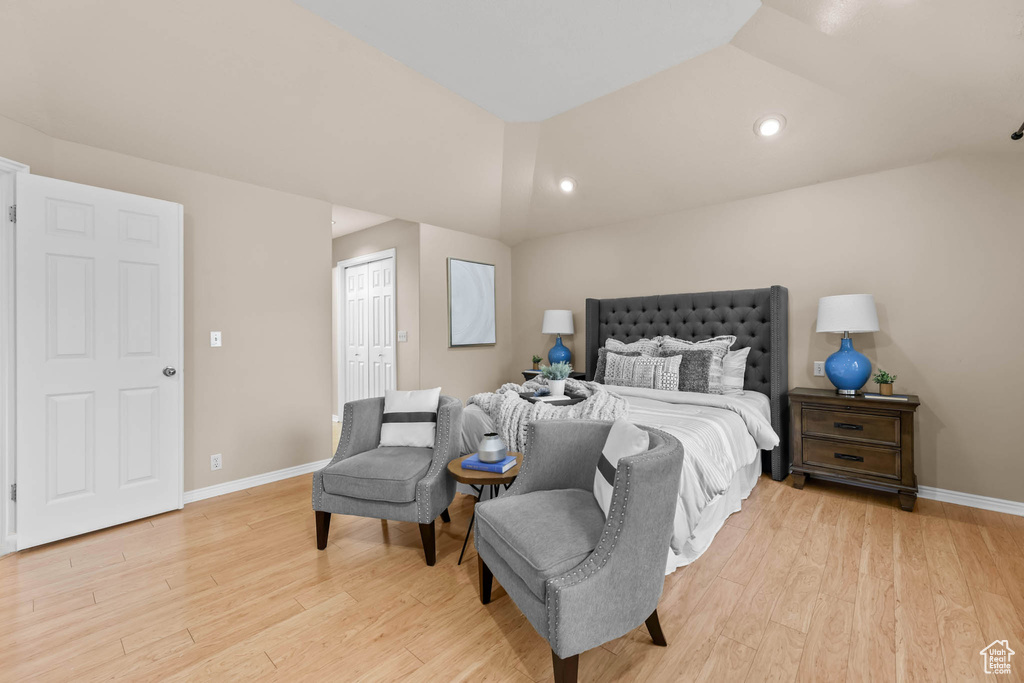 Bedroom featuring light wood-style floors, baseboards, and recessed lighting