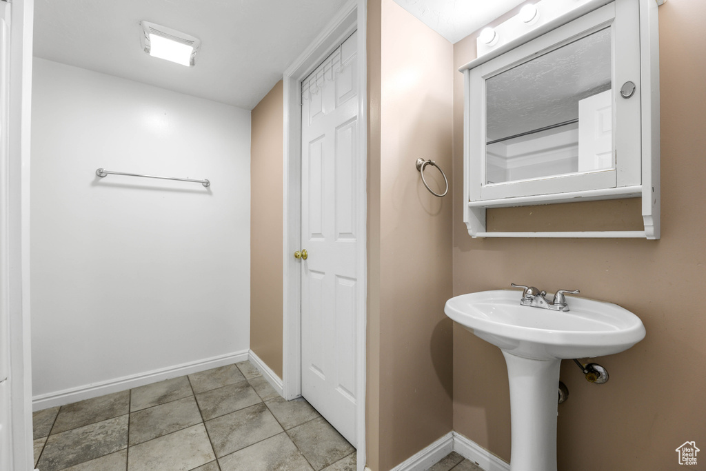 Bathroom featuring baseboards