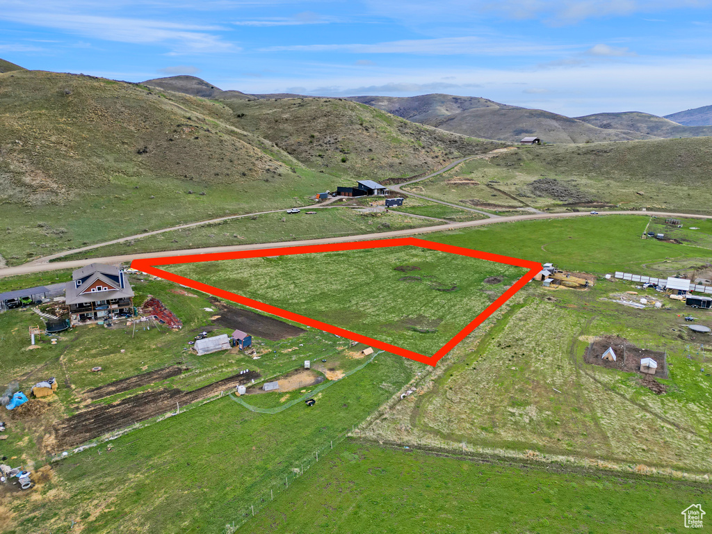 Aerial view with a rural view and a mountain view
