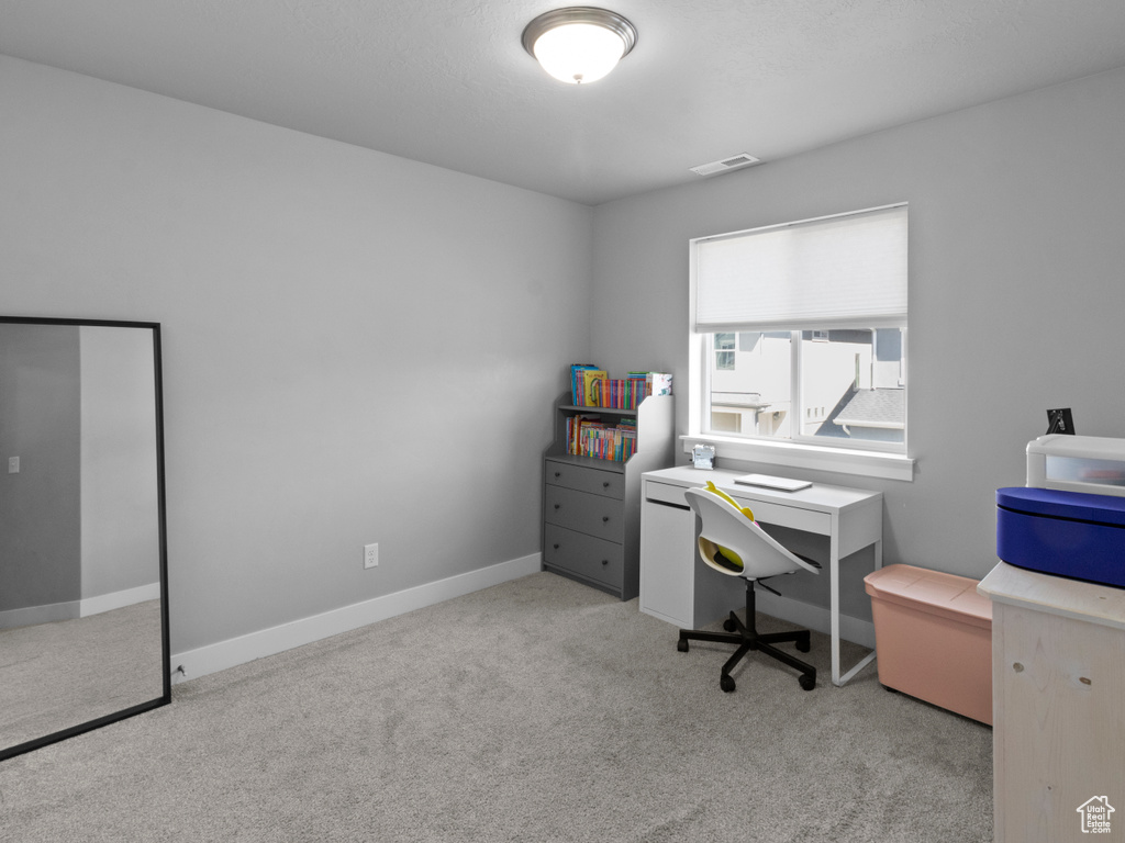 Office featuring carpet floors and baseboards