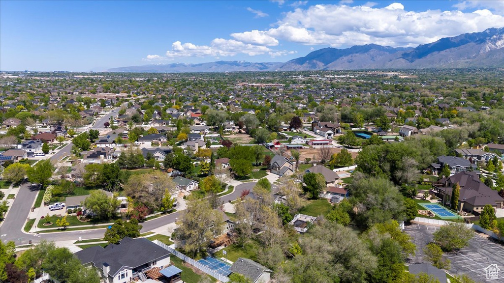 Aerial perspective of suburban area featuring mountains