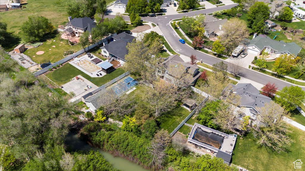 Aerial view of property's location featuring nearby suburban area