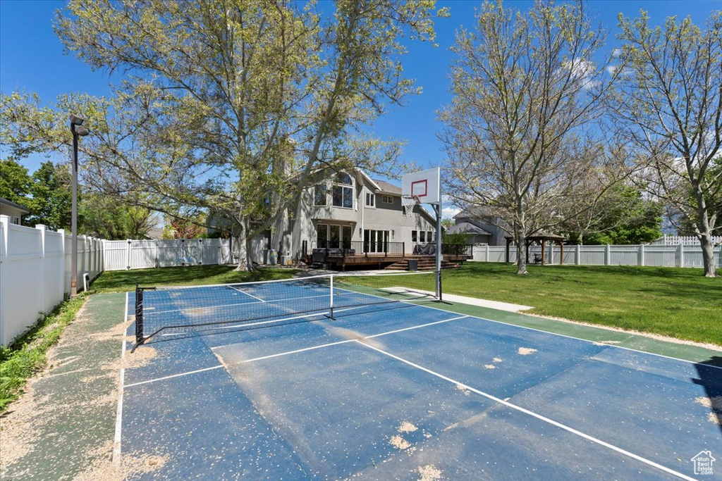 View of basketball court with a tennis court