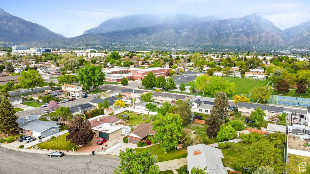 Aerial view of residential area featuring mountains
