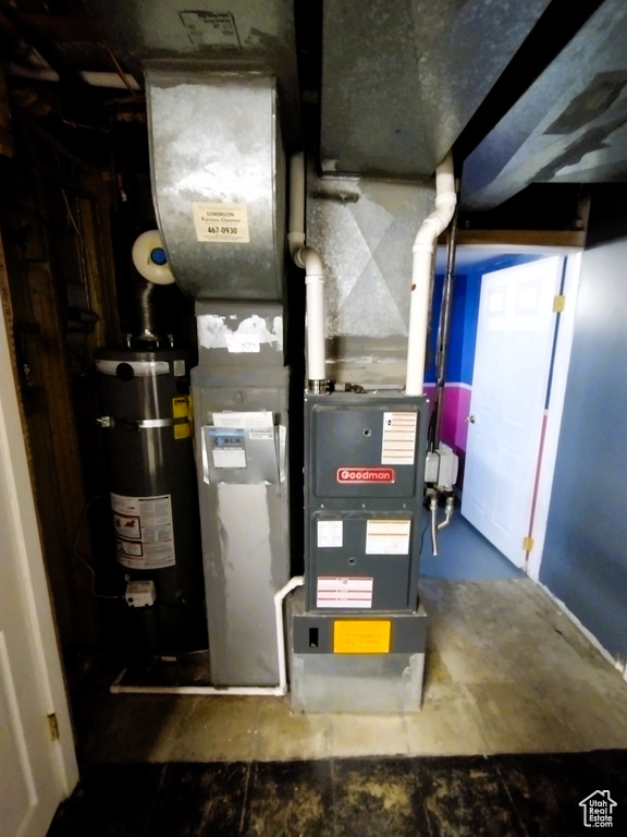 Utility room with strapped water heater