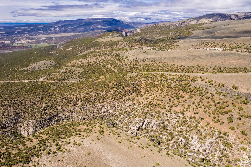 Aerial view of sparsely populated area featuring a mountainous background