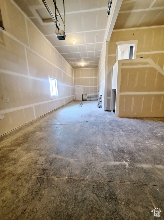 Garage featuring a garage door opener