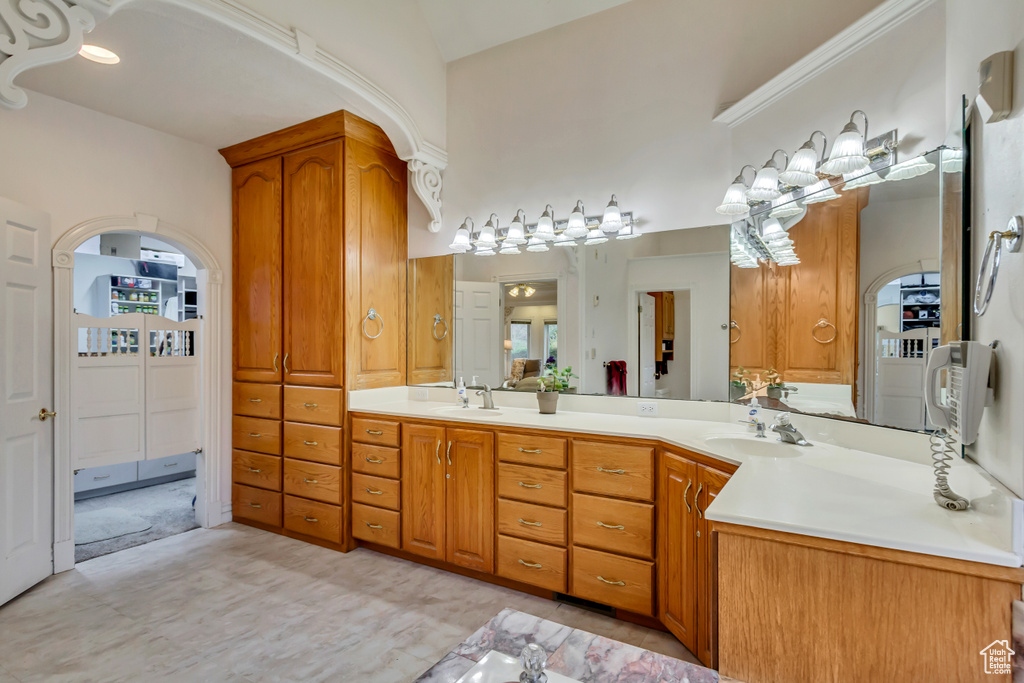 Full bathroom featuring double vanity