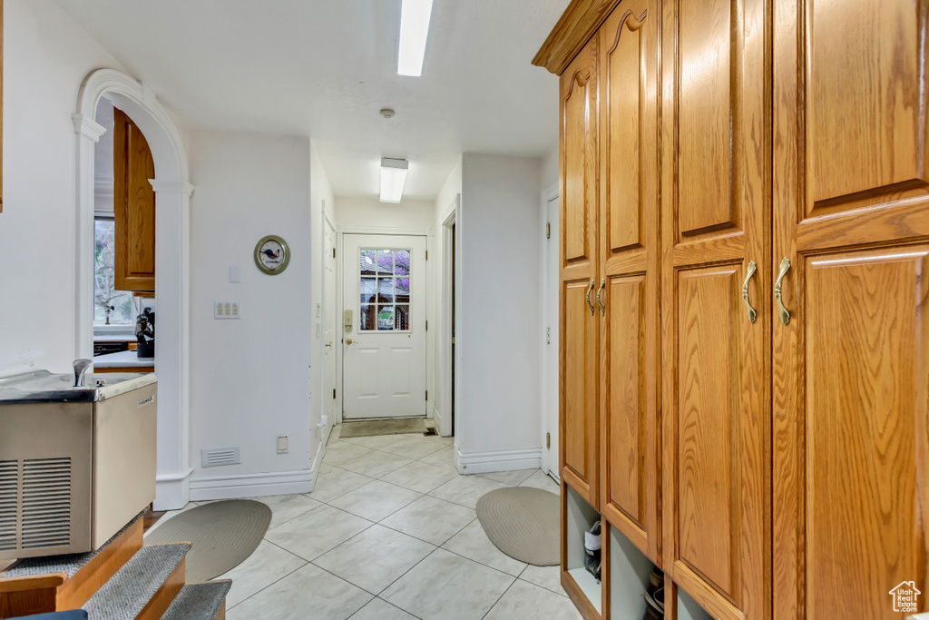 Bathroom featuring tile patterned flooring and baseboards