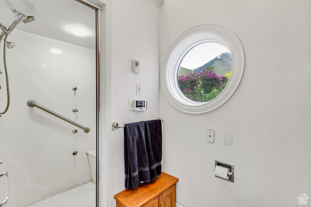 Full bathroom with a stall shower