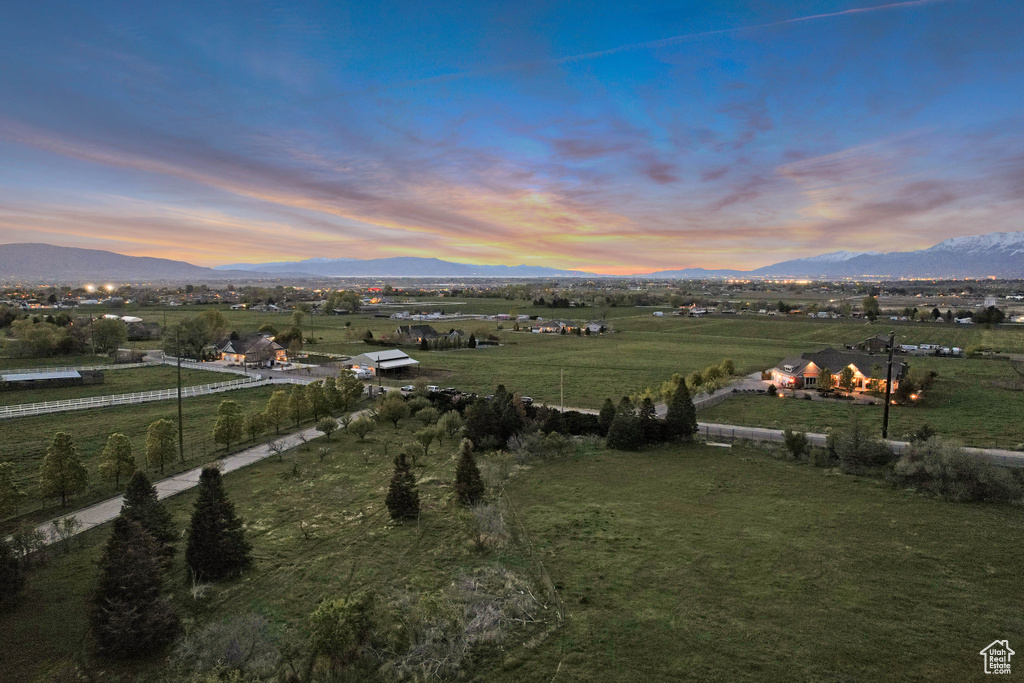 View of mountain background featuring rural landscape