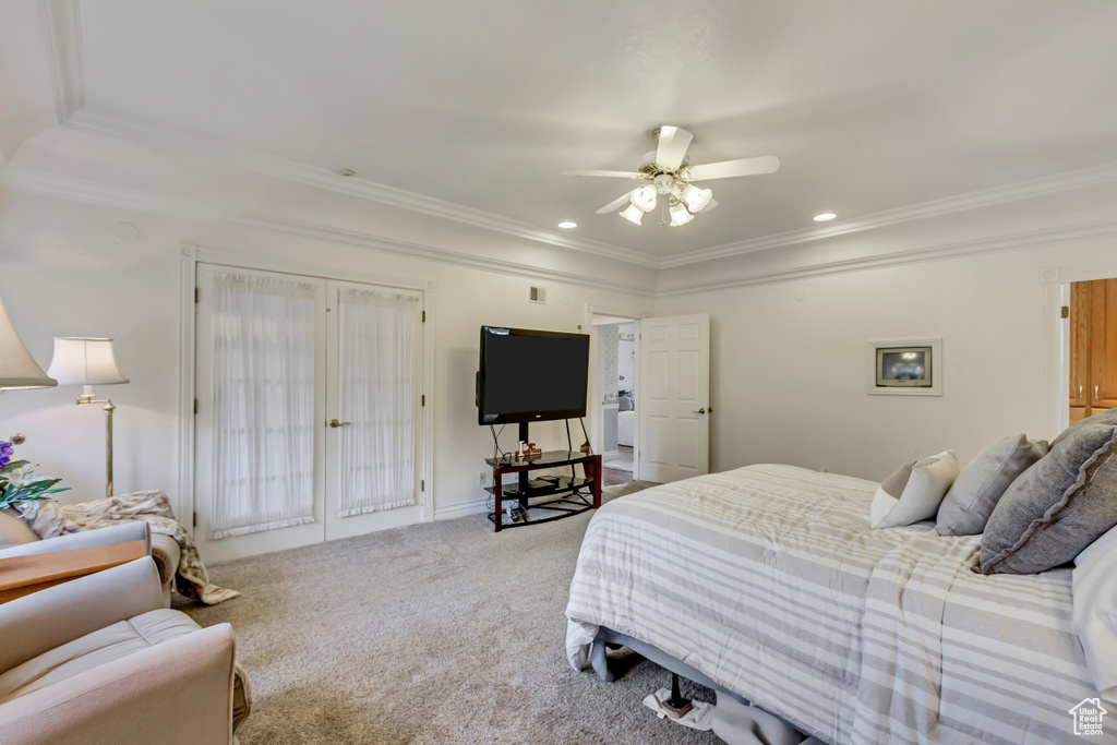 Carpeted bedroom featuring ornamental molding, ceiling fan, and recessed lighting