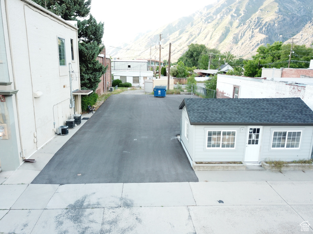 View of concrete road featuring a mountain view