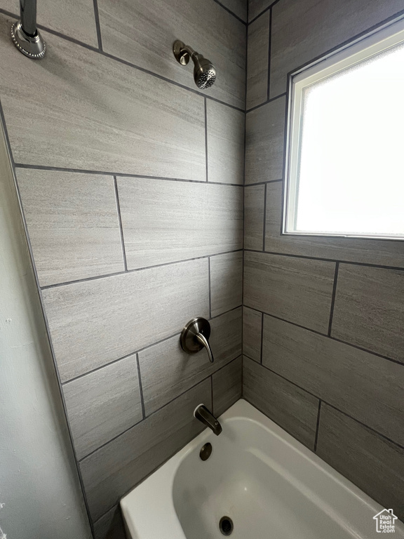 Bathroom featuring shower / bathtub combination