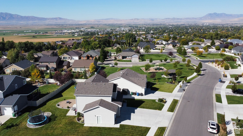View of property location featuring a mountainous background and nearby suburban area